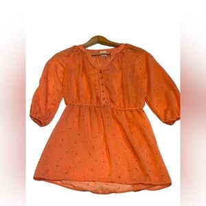orange blouse with multi colored hearts design